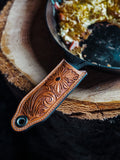 Tooled Cast Iron Handle Cover